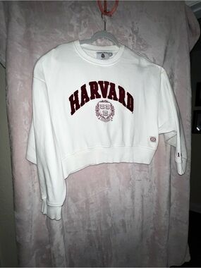 Harvard White Cropped Crewneck Sweatshirt with Maroon Arch Logo